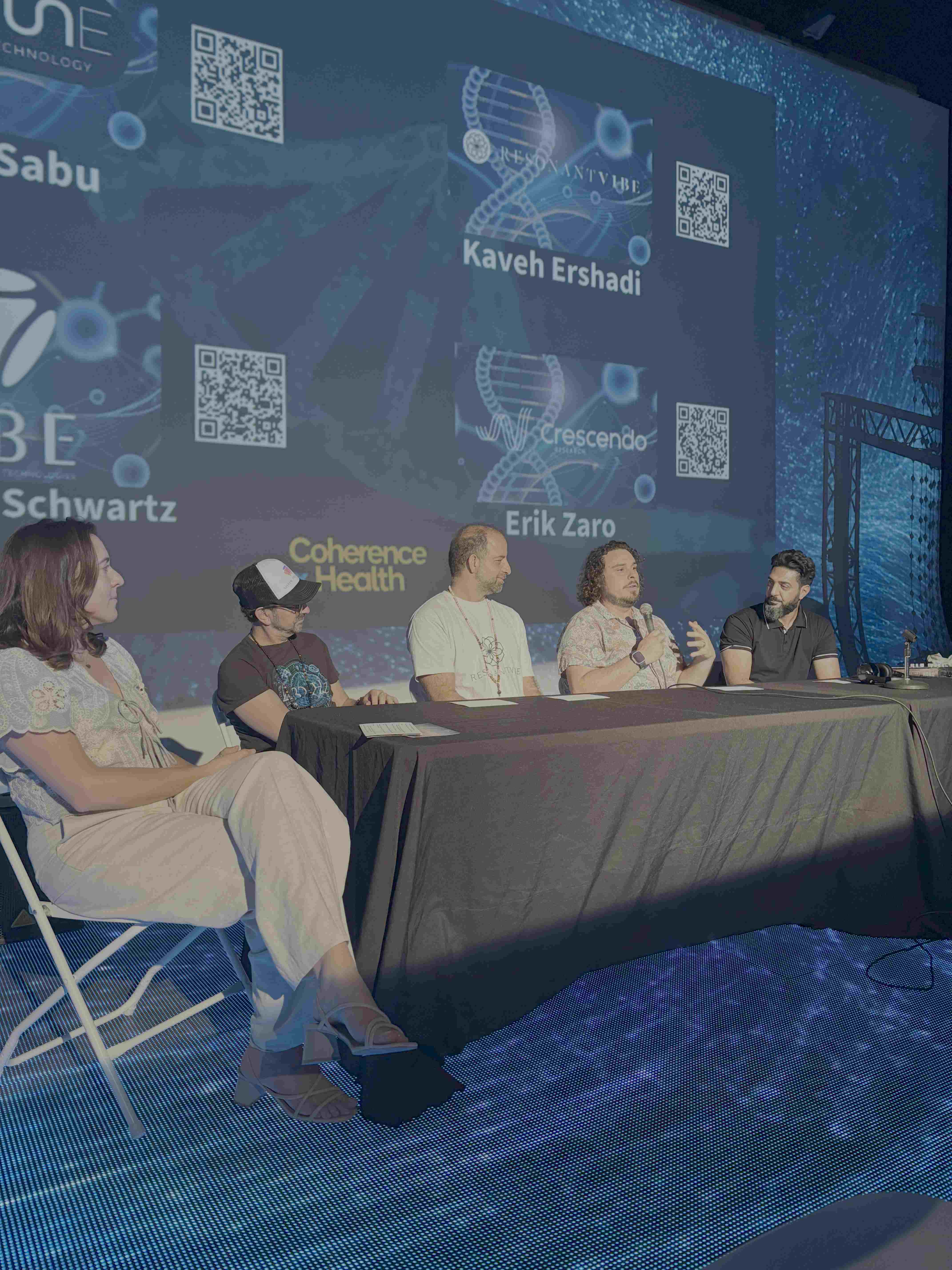 Close-up of panel speakers under blue LED wash